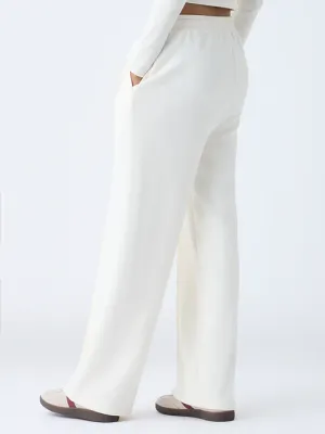 Off-White Solid High-Rise Pants
